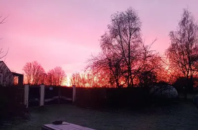 Lever ou coucher de soleil vu de la maison de vacances ou à proximité