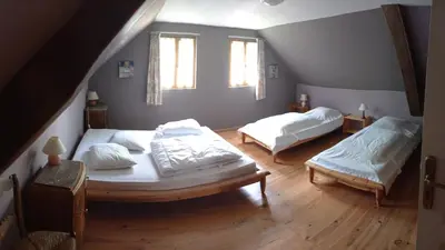 Un ou plusieurs lits dans un hébergement de l'établissement Gîte de la Gagée