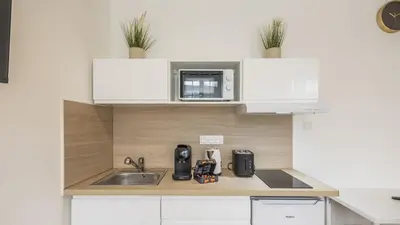 Cuisine ou kitchenette dans l'établissement Manu Chalons
