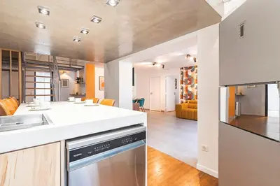 Cuisine ou kitchenette dans l'établissement MM Suites City House Cathedrale