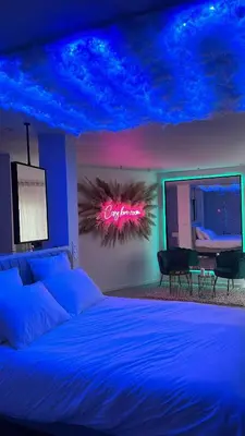 Un ou plusieurs lits dans un hébergement de l'établissement Cosy Love Room