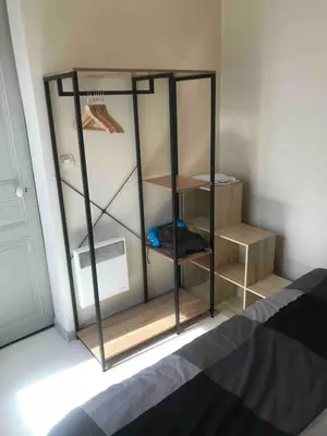 Un ou plusieurs lits superposés dans un hébergement de l'établissement Appartement hyper centre