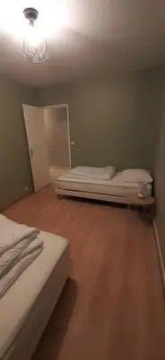 Un ou plusieurs lits dans un hébergement de l'établissement Appartement 4 PERSONNES 70m2 8