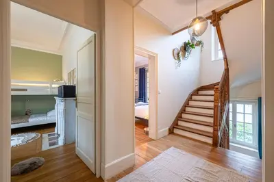 Un ou plusieurs lits dans un hébergement de l'établissement Villa Les Roches - Confort & Relaxation
