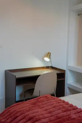 Un ou plusieurs lits dans un hébergement de l'établissement T2 Cosy - Proche centre - Stationnement gratuit
