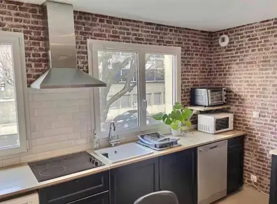 Cuisine ou kitchenette dans l'établissement Appartement lumineux 45 m2 avec parking proche gare et centre de Reims