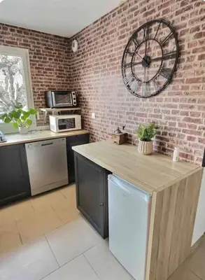 Cuisine ou kitchenette dans l'établissement Appartement lumineux 45 m2 avec parking proche gare et centre de Reims