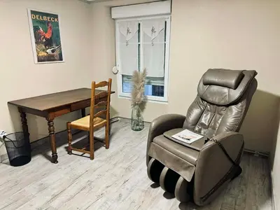Coin salon dans l'établissement Large and cozy family home