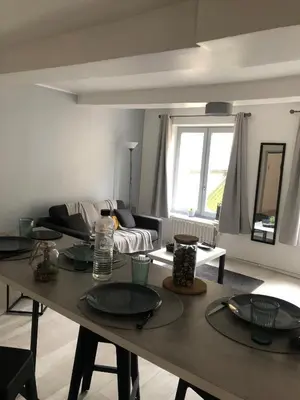 Coin salon dans l'établissement Chez Nath House