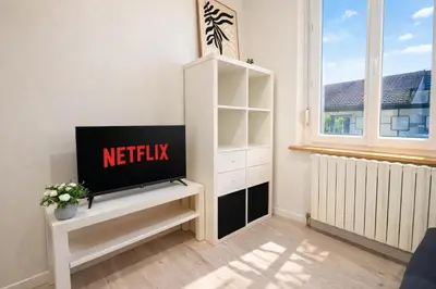 Télévision ou salle de divertissement dans l'établissement Urban Duplex