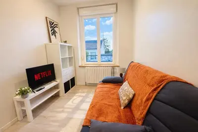 Télévision ou salle de divertissement dans l'établissement Urban Duplex