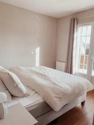Un ou plusieurs lits dans un hébergement de l'établissement Villa Belle Cuvée