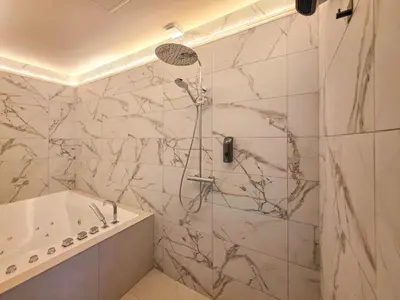 Salle de bains dans l'établissement Songe de Savane - Spa Ultra-centre St Quentin