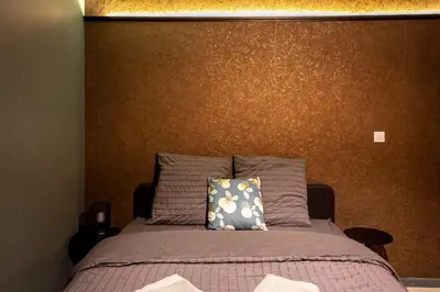 Un ou plusieurs lits dans un hébergement de l'établissement Horizon des Sens - Spa&Sauna Epicentre St Quentin