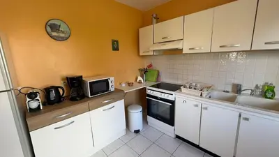 Cuisine ou kitchenette dans l'établissement Gite du tilleul 6 personnes à la campagne proche Disneyland Paris