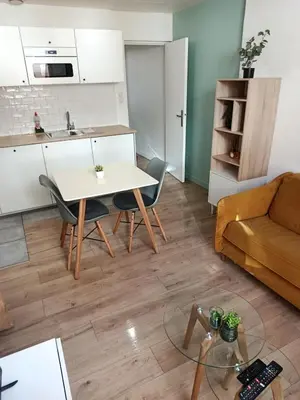 Cuisine ou kitchenette dans l'établissement La Suite Marlot
