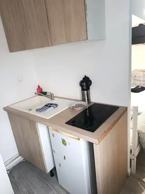 Cuisine ou kitchenette dans l'établissement Studio des Capucins 2