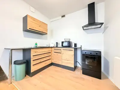 Cuisine ou kitchenette dans l'établissement Le Nid Laonnois Apartment