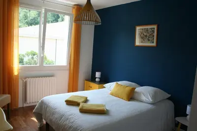 Un ou plusieurs lits dans un hébergement de l'établissement La Maison du Terme Finet - 3 chambres
