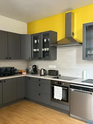 Cuisine ou kitchenette dans l'établissement Appartement spacieux avec parking privé