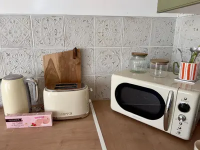 Cuisine ou kitchenette dans l'établissement La Romance