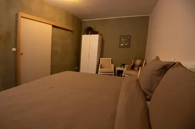 Un ou plusieurs lits dans un hébergement de l'établissement Le Mont Cigale - chambres d'hôtes et restaurant