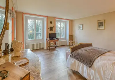 Un ou plusieurs lits dans un hébergement de l'établissement Maison de Charme a Rémy