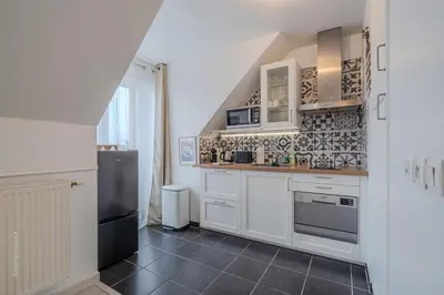 Cuisine ou kitchenette dans l'établissement Urban Cozy Nest Paris 25 min - Disney 20min
