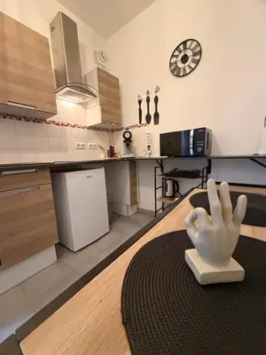 Cuisine ou kitchenette dans l'établissement L'instant Nevers