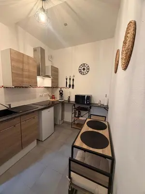 Cuisine ou kitchenette dans l'établissement L'instant Nevers