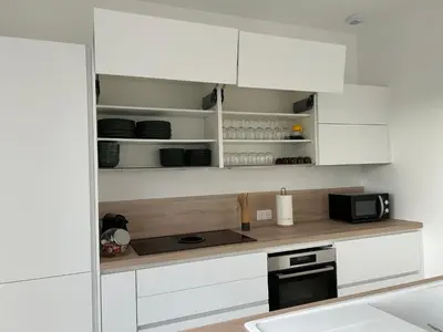Cuisine ou kitchenette dans l'établissement L Écrin des églisières