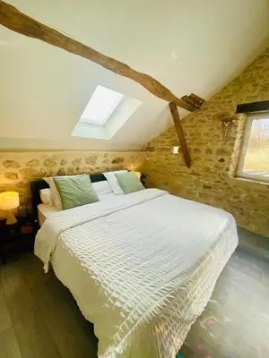 Un ou plusieurs lits dans un hébergement de l'établissement Maison en pleine nature