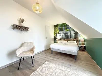 Un ou plusieurs lits dans un hébergement de l'établissement Villa avec Spa & Cinéma à 35 min d'Asterix