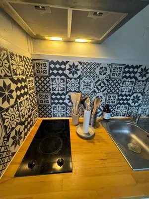 Cuisine ou kitchenette dans l'établissement Les 4 Piliers