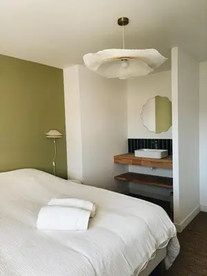 Un ou plusieurs lits dans un hébergement de l'établissement Saint Marc, corps de ferme champenois