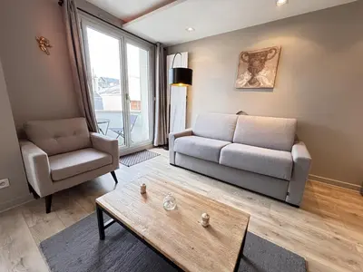 Coin salon dans l'établissement L'écrin Urbain studio chic et lumineux avec Balcon