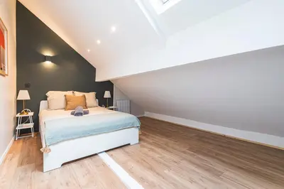 Un ou plusieurs lits dans un hébergement de l'établissement Loft des Moissons - central and double parking