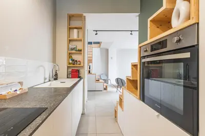 Cuisine ou kitchenette dans l'établissement Loft des Moissons - central and double parking