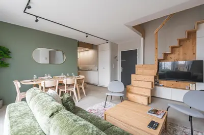 Télévision ou salle de divertissement dans l'établissement Loft des Moissons - central and double parking
