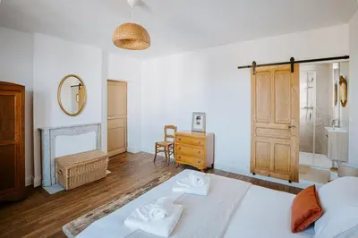 Un ou plusieurs lits dans un hébergement de l'établissement La Villa Madeleine