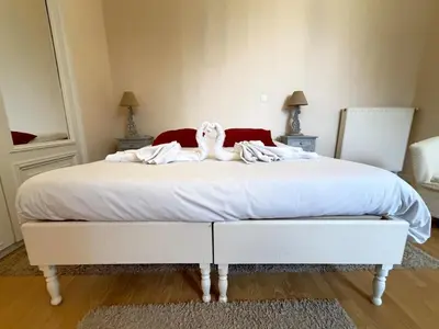 Un ou plusieurs lits dans un hébergement de l'établissement Studio au cœur du château