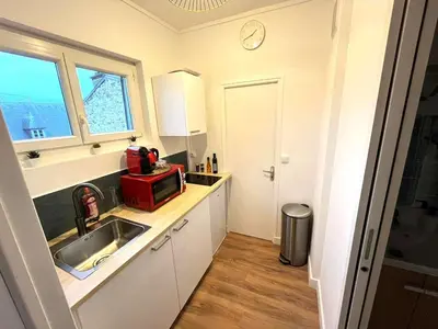Cuisine ou kitchenette dans l'établissement Charmant T2 à Reims, parfait pour couples ou professionnels - FR-1-870-18