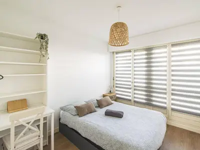 Un ou plusieurs lits dans un hébergement de l'établissement Appartement spacieux avec terrasse privative à Reims - FR-1-870-7