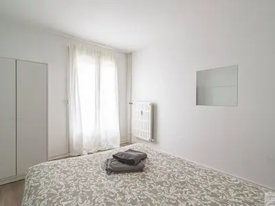 Un ou plusieurs lits dans un hébergement de l'établissement Appartement Lumineux avec WiFi au Cœur de Reims - FR-1-870-25