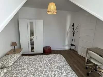 Un ou plusieurs lits dans un hébergement de l'établissement Charme Central : Grand Appart à Reims - FR-1-870-32