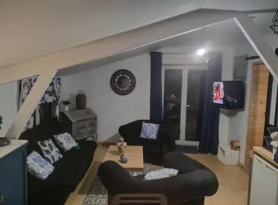 Télévision ou salle de divertissement dans l'établissement Mise au vert