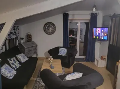 Télévision ou salle de divertissement dans l'établissement Mise au vert