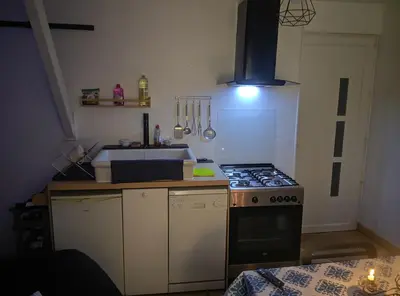 Cuisine ou kitchenette dans l'établissement Mise au vert
