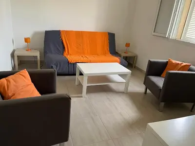 Coin salon dans l'établissement Loue rez de maison 3mn de la plage