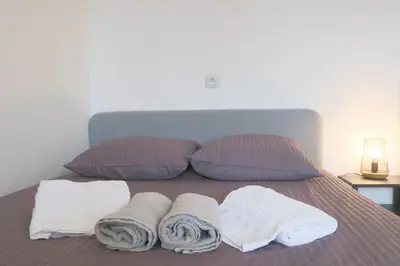 Un ou plusieurs lits dans un hébergement de l'établissement Smart Appart, spacious and functional